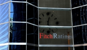 Fitch повыcило рейтинги